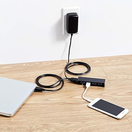 Amazon Basics Slim High-Speed 4 Port USB 3.0 Hub with AC Adapter for use with MacBook, Mac Pro, iMac, Surface Pro and more - Black